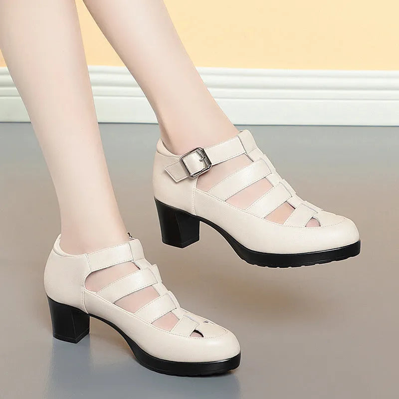 Women's beige closed toe sandals with chunky heel, woven design, and adjustable ankle-strap buckle