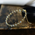 Women's bracelet with 6mm blue moonstone beads and 14K gold plating