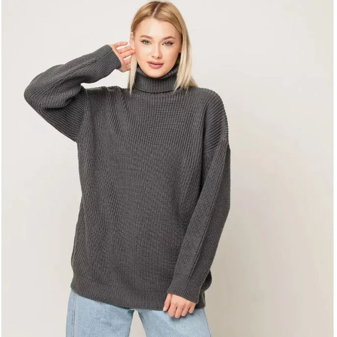 Women's solid colour high neck pullover sweater in a loose fit, shown in grey.