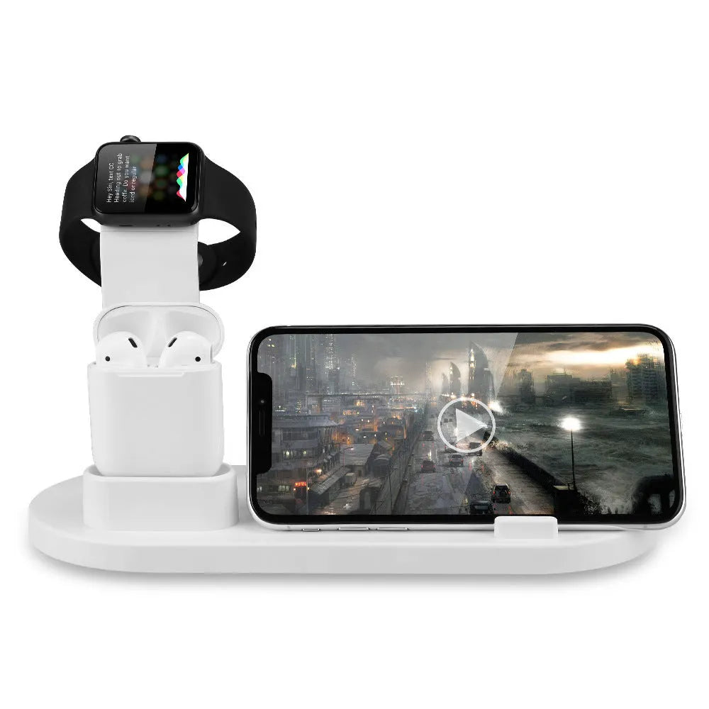 White or black plastic headphone charging stand with a USB port for phones.