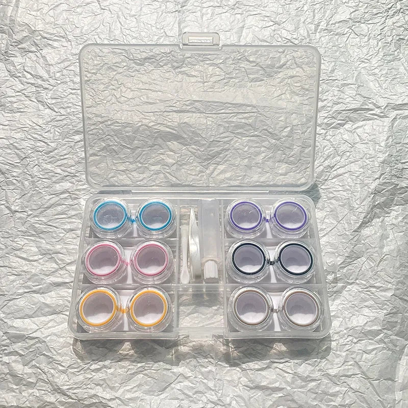 Rectangular contact lens case in various colour combinations including black white and pink white