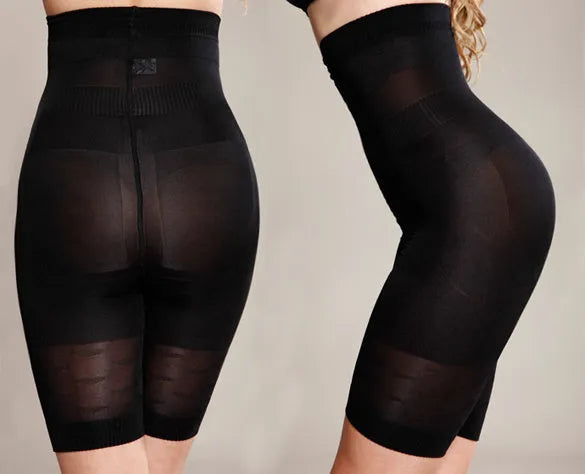 Black high-waist seamless shapewear shorts laid flat showing the waistband and short length.