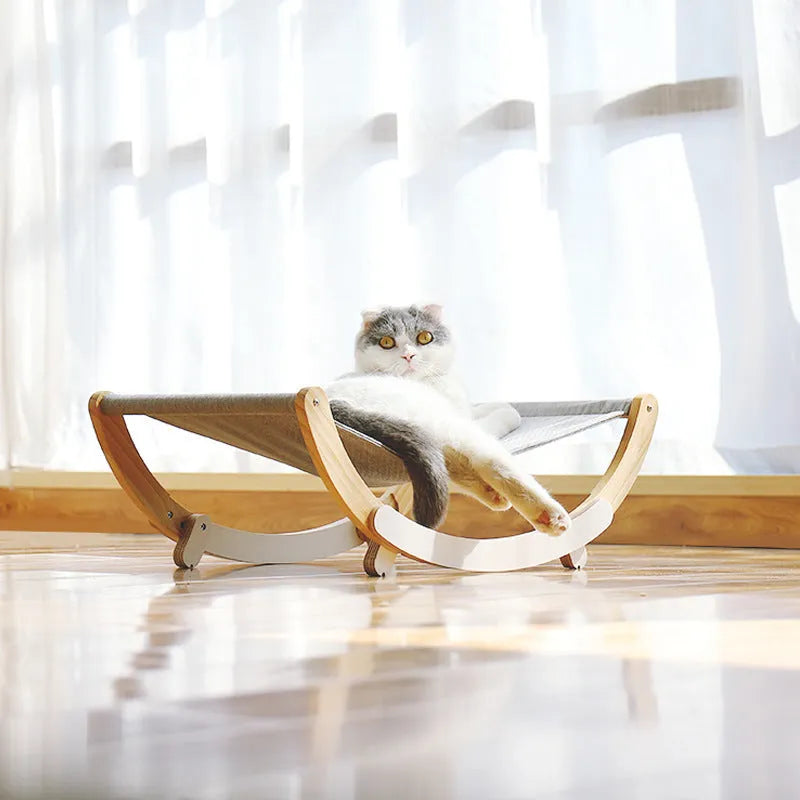 Solid wood cat shaker pet nest with off-ground design, anti-slip mat, and grey or blue cloth cushion, 56.5x30cm