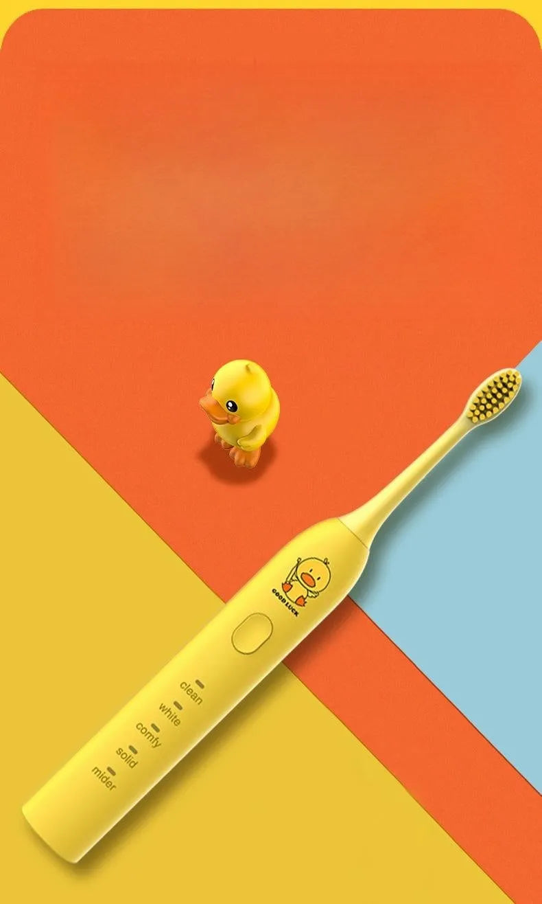 Yellow USB rechargeable adult electric toothbrush with small duck design and soft bristles.