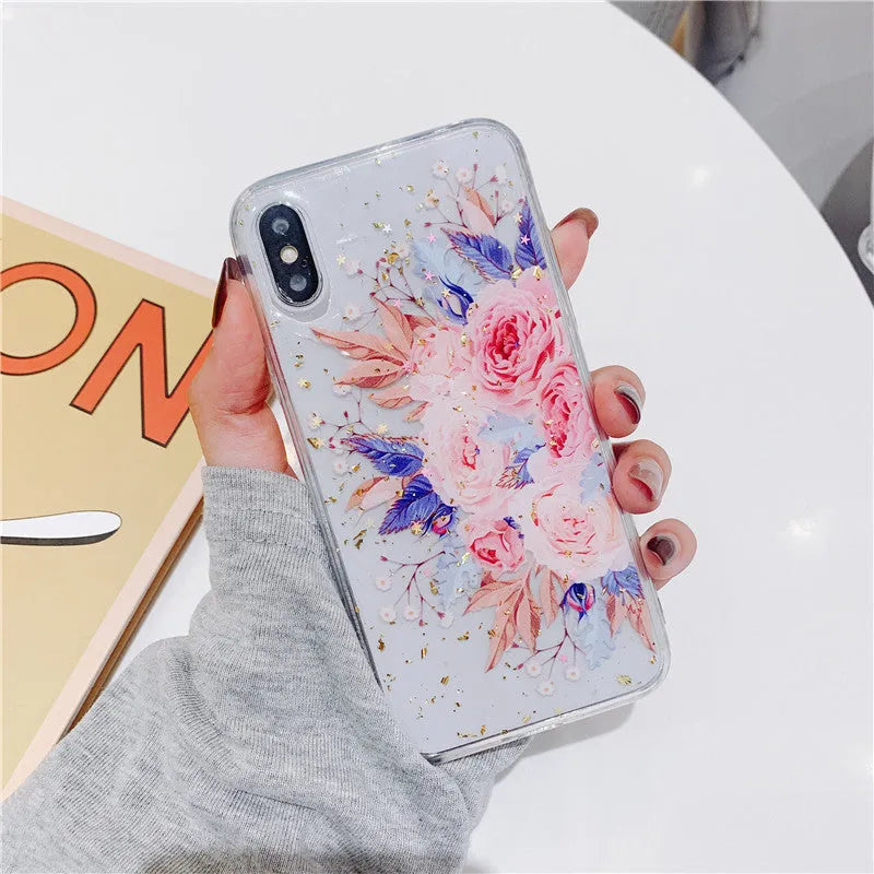 Gold foil epoxy flower pattern iPhone back cover case for iPhone 11 Pro on a table