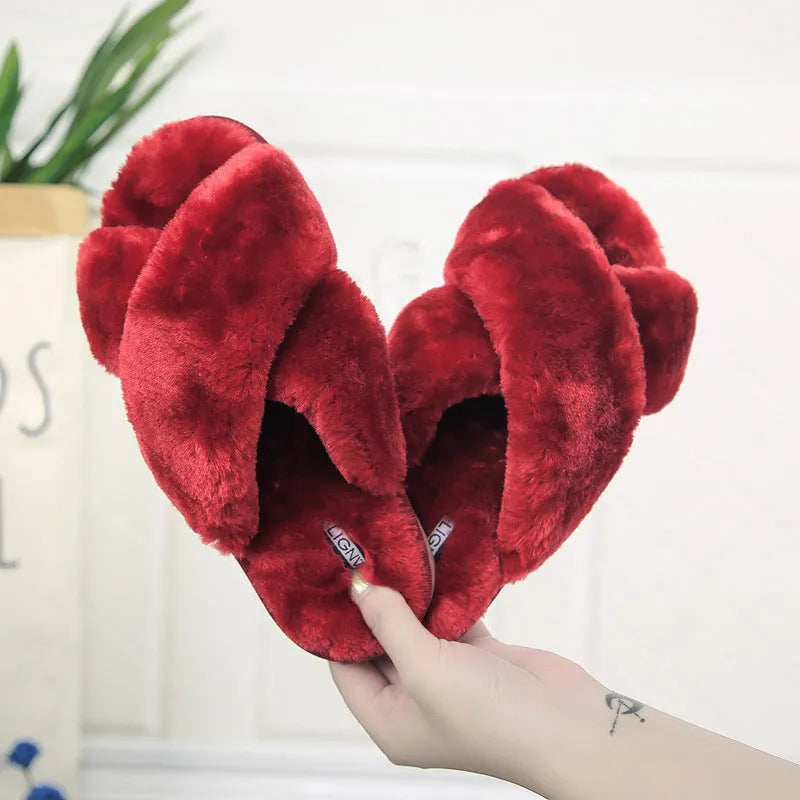 Cross open-toe fur slippers in black with a patterned non-slip rubber sole.
