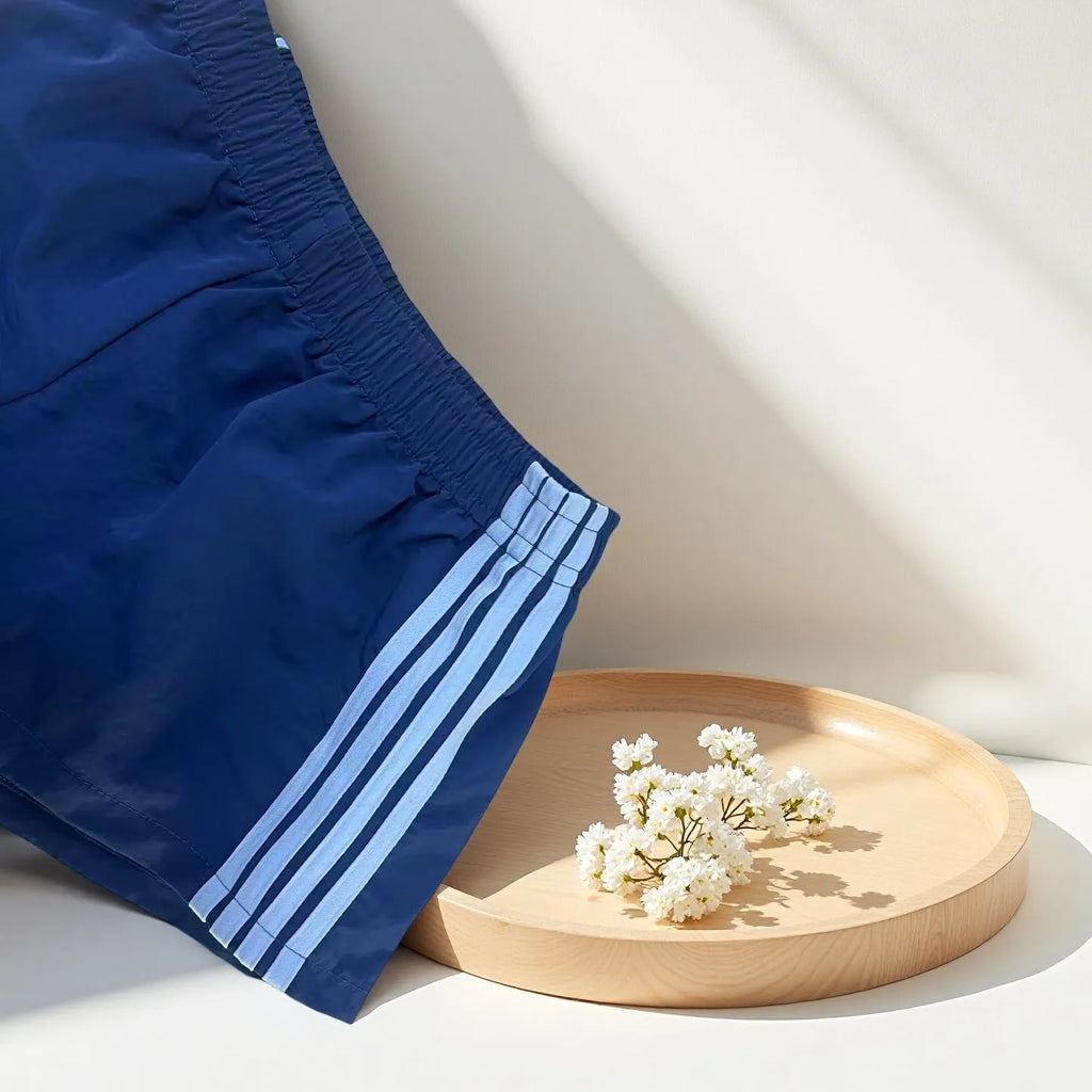 Navy blue men's high waist casual sports shorts made from micro-elastic nylon fabric