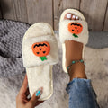 Yellow Halloween pumpkin plush open-toe slippers with synthetic fur and anti-slip PVC soles