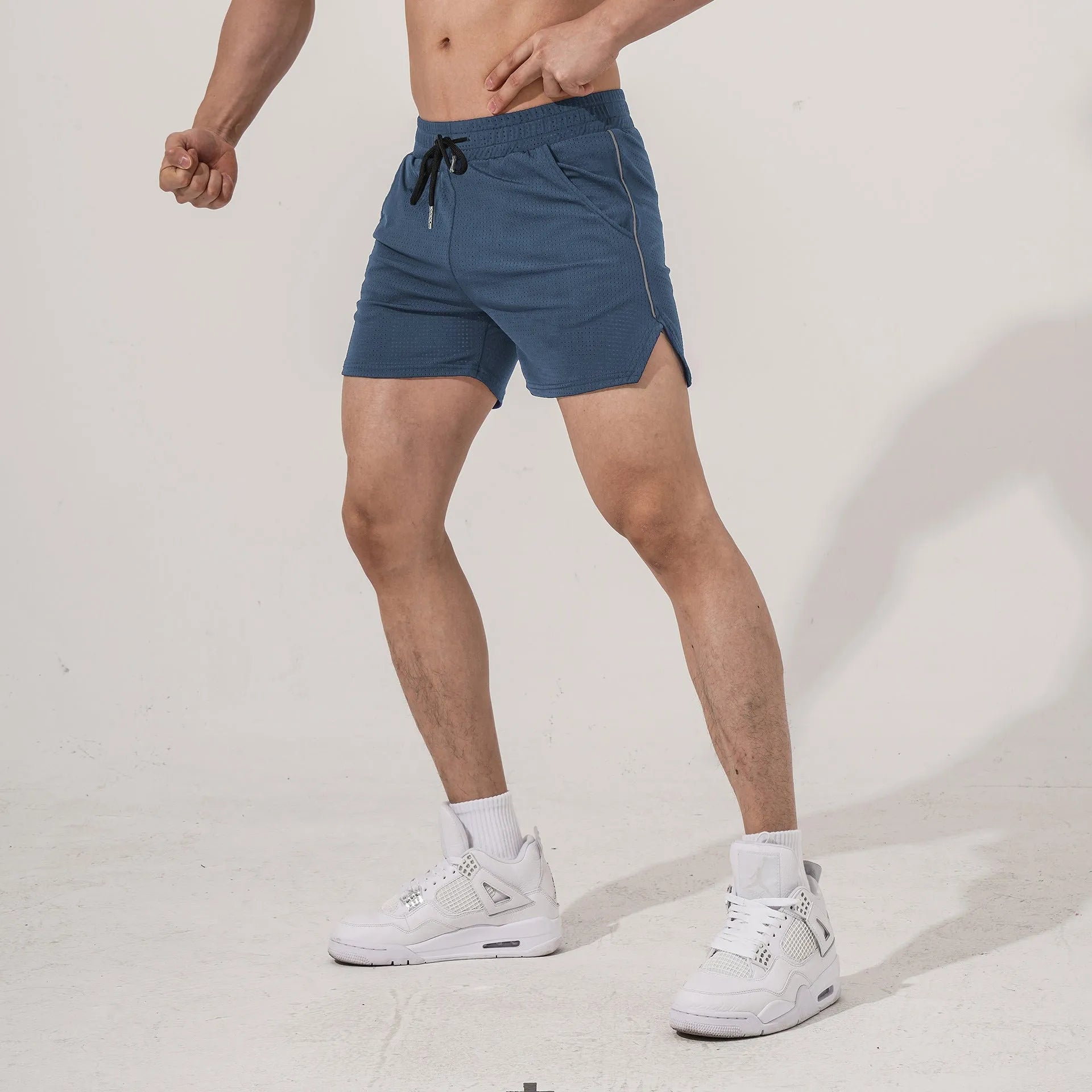 Men's polyester sports casual shorts in black, grey, navy blue, or red colours