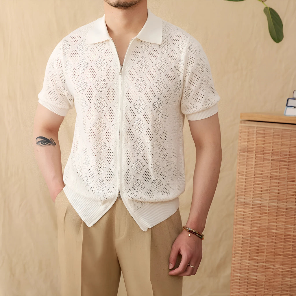 Light brown cotton short sleeve cardigan with a front zipper and lapel collar on a hanger.