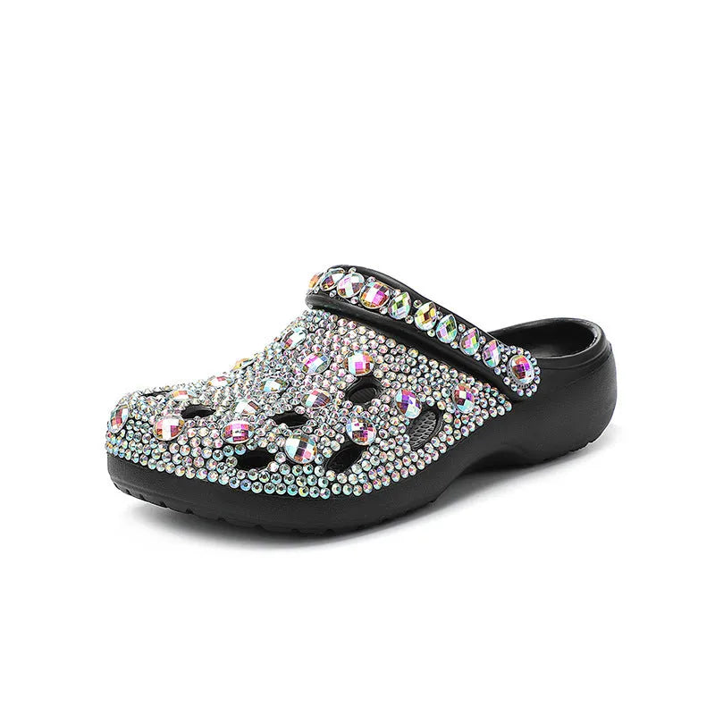 Black platform sandals for women with rhinestone detail and open-hole design on a lightweight EVA sole.