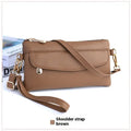 Soft PU leather crossbody bag in a square shape showing the internal sandwich zipper pocket.