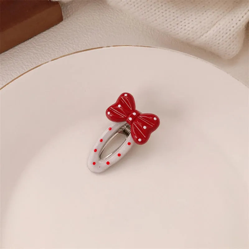 Red stereo love heart-shaped hairpin with French retro dots and willow leaf design