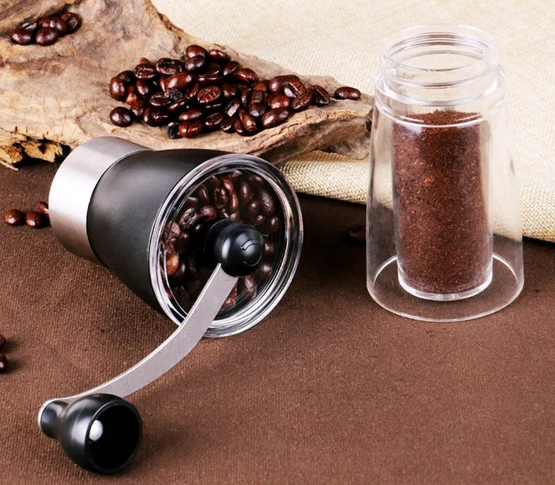 Hand coffee grinder 6cm by 17cm 310g black manual burr grinder on white background