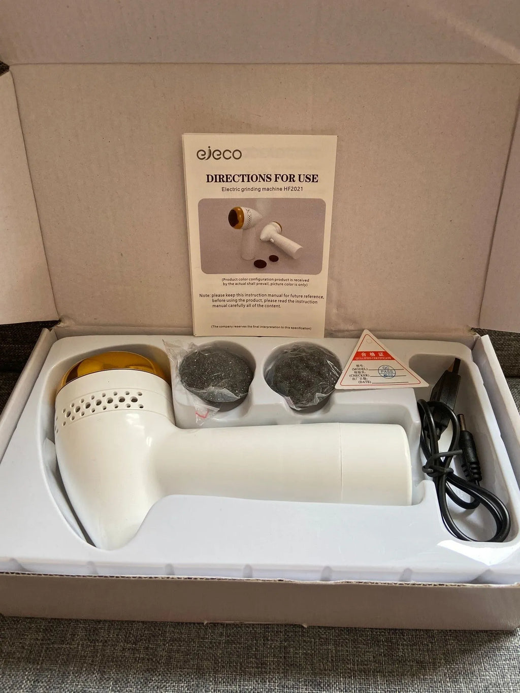 Electric vacuum foot grinder with quartz grinding head in gold, pink, or white colour options
