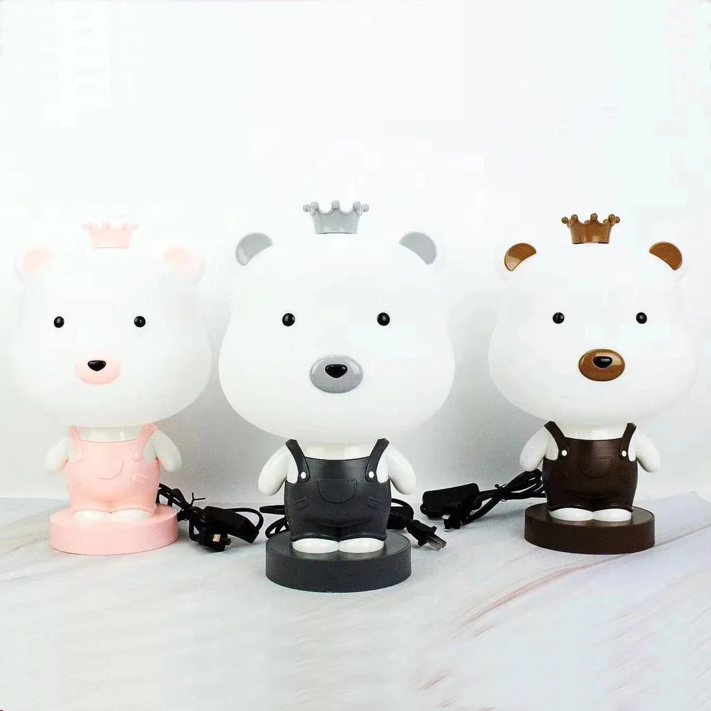 Cartoon style animal table lamp with plastic shade in random colour variation showing bear cattle rabbit or tiger design