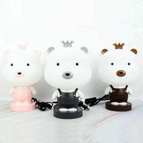 Cartoon style animal table lamp with plastic shade in random colour variation showing bear cattle rabbit or tiger design