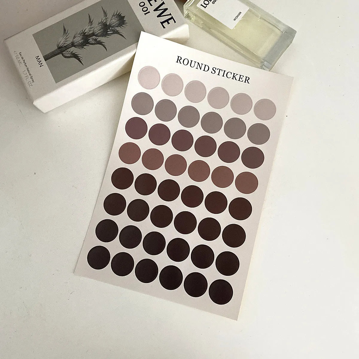 Morandi earth colour polka dot hand account seal sticker sheet with 48 individual 2cm circles.