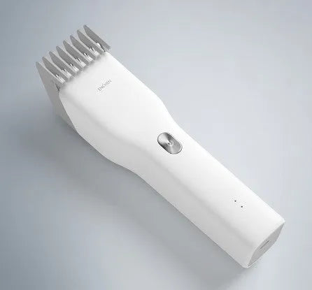 Black cordless hair clippers with ceramic cutter head and adjustable length comb for home barbering