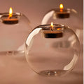 Handmade round hollow glass candle holder with clear glass construction