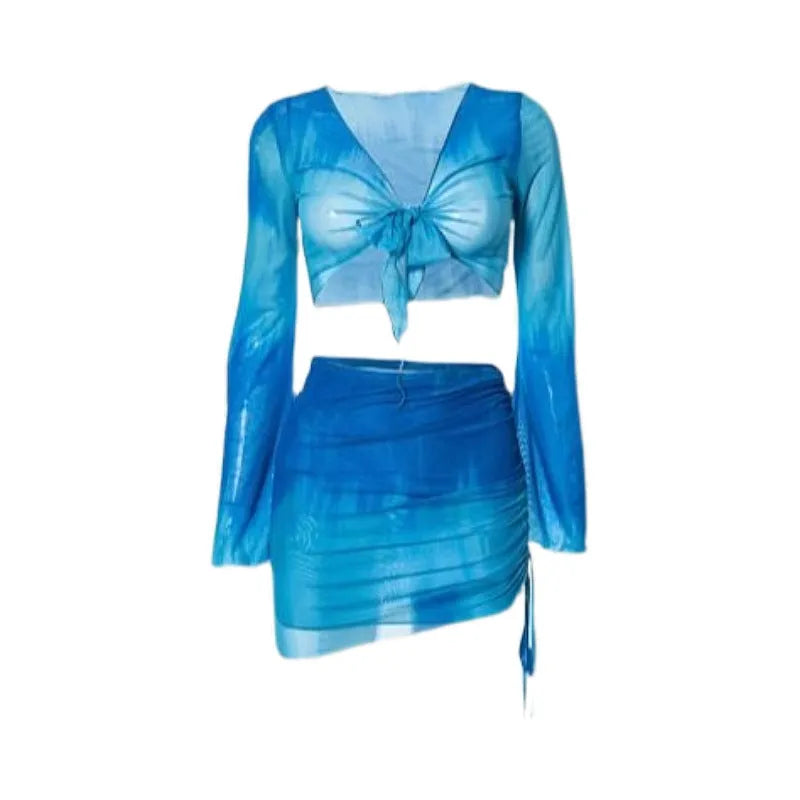 Women's blue high-waisted bikini four-piece swimsuit set with shirt, bra, underwear, and skirt for beach wear