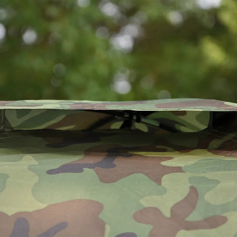 Green camouflage camping tent with steel ground nails and mesh windows for outdoor use