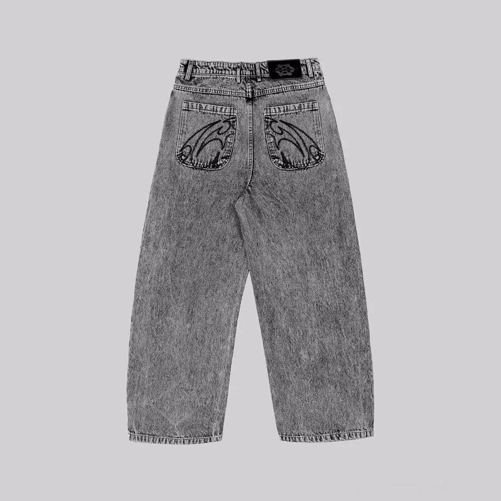 Grey loose-fit straight-leg denim trousers for men laid flat, showing mid-waist and straight-leg cut.