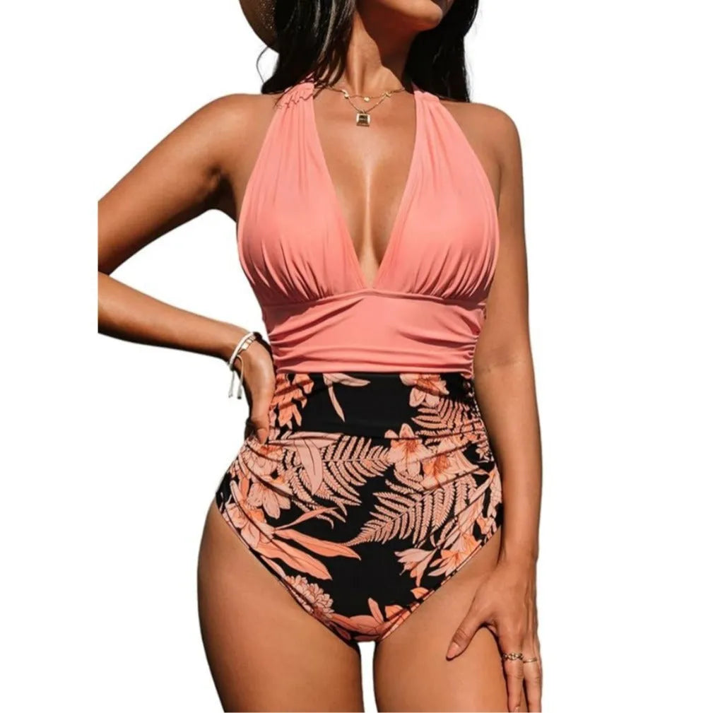 Women's backless halter one-piece swimsuit in a floral print pattern.