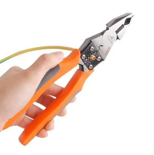 Orange handled multi-function wire cutter with forged alloy steel jaws on a workbench.