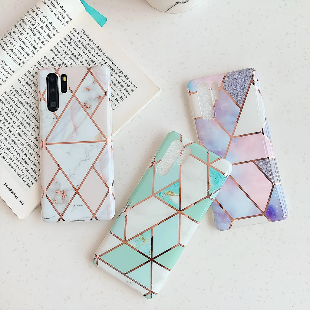 Electroplated marble pattern TPU back cover case for a Huawei or Samsung smartphone.