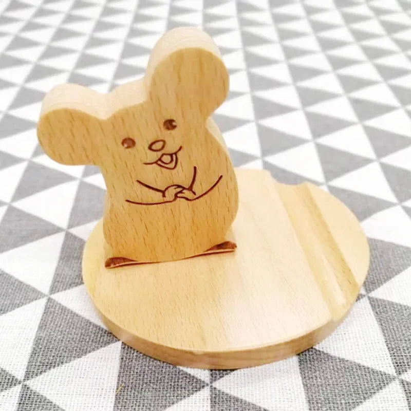 Handcrafted beech wood and resin lazy bracket mobile phone holder on a wooden desk