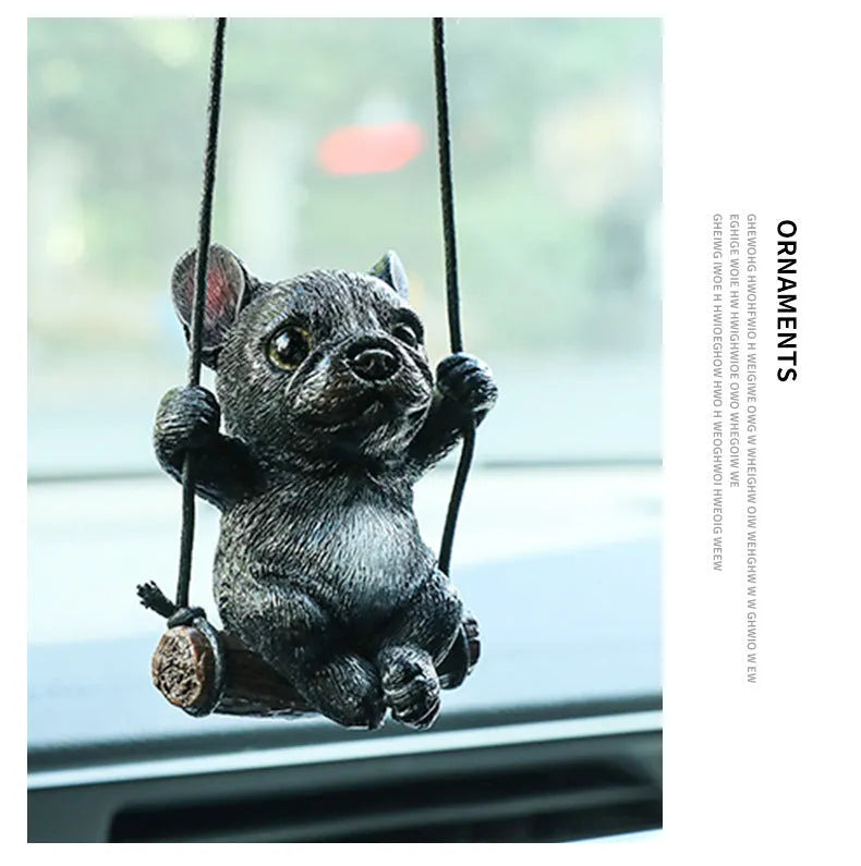 Cartoon-style resin bulldog car pendant hanging ornament in black, white, or yellow.