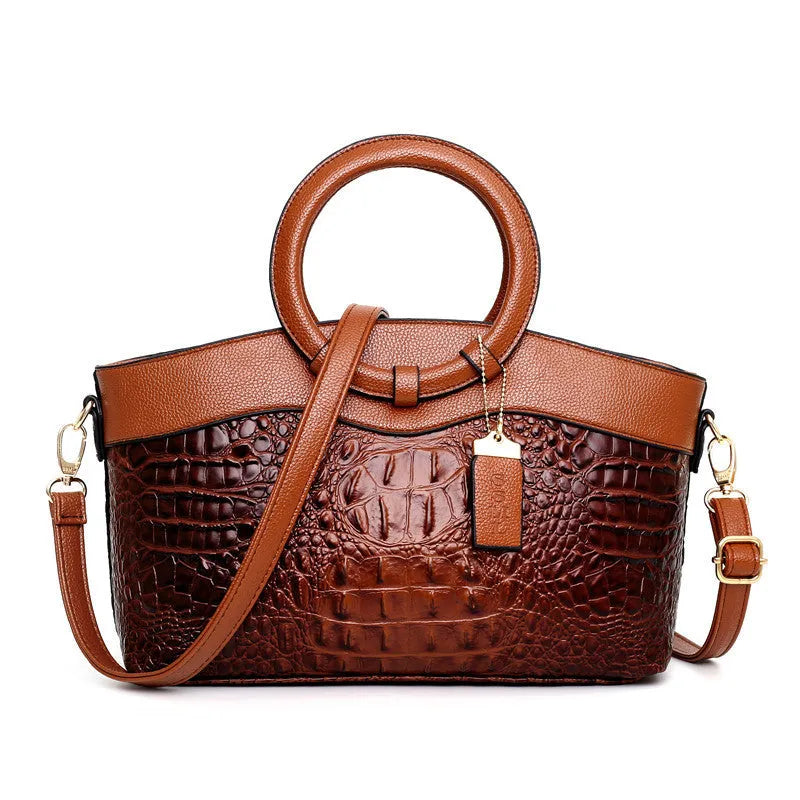 A casual fabric shoulder bag for women in multiple colours, showing zipper pockets and a handle.