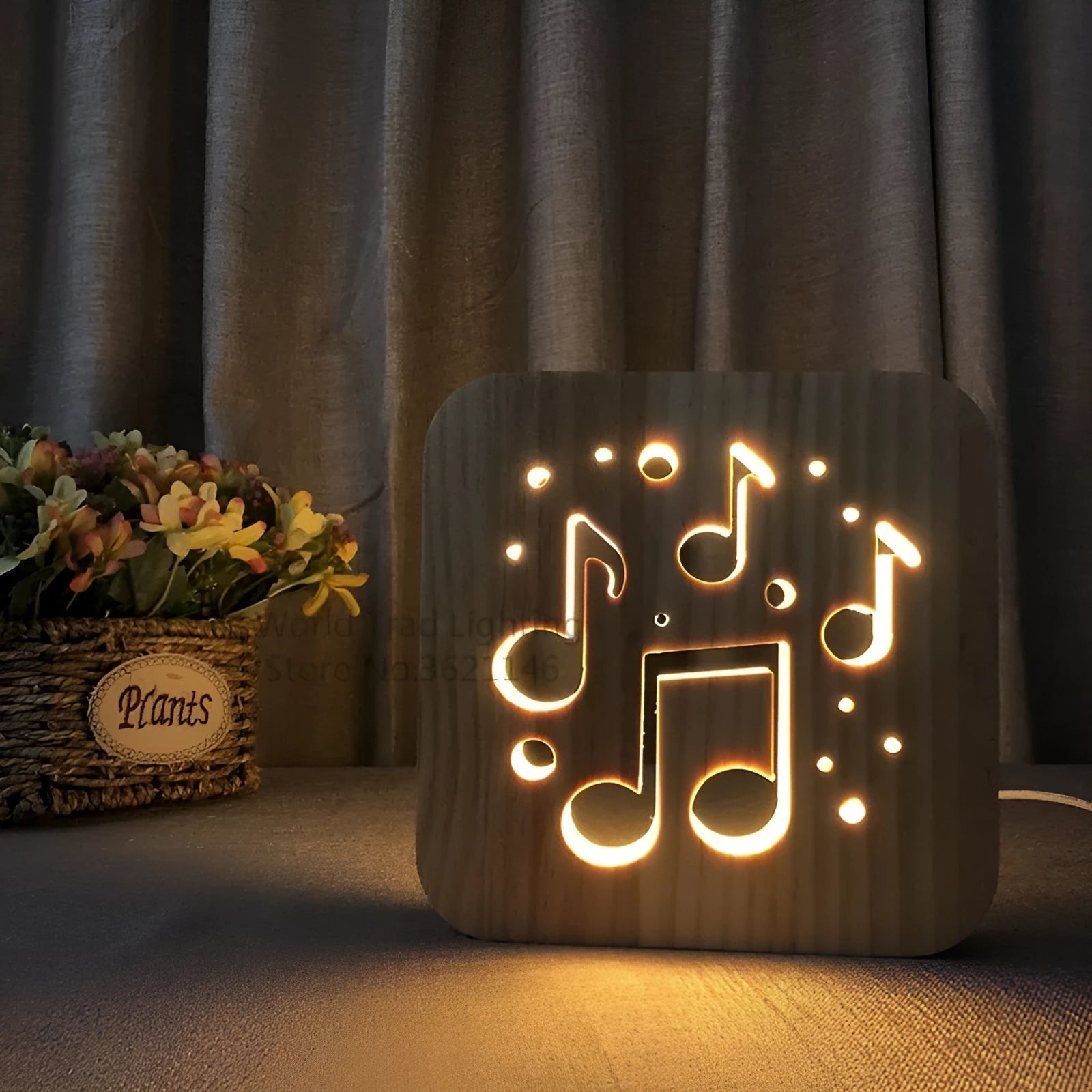 Square 3D wooden lattice USB lamp emitting warm white light on a desk, showing pine grain and USB cable.