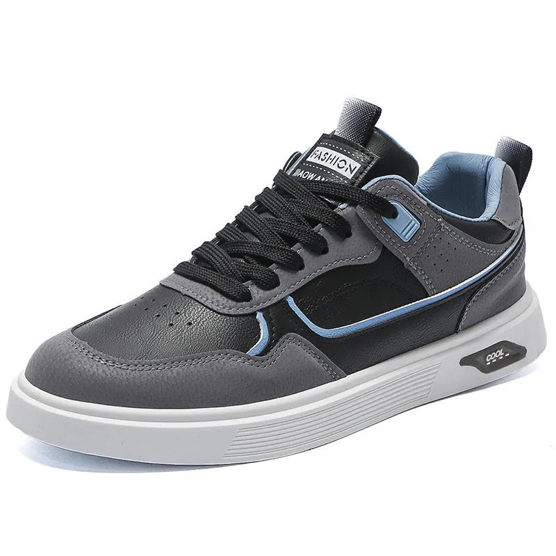Men's low-top beige canvas board shoes with leather stitching details on a white background.