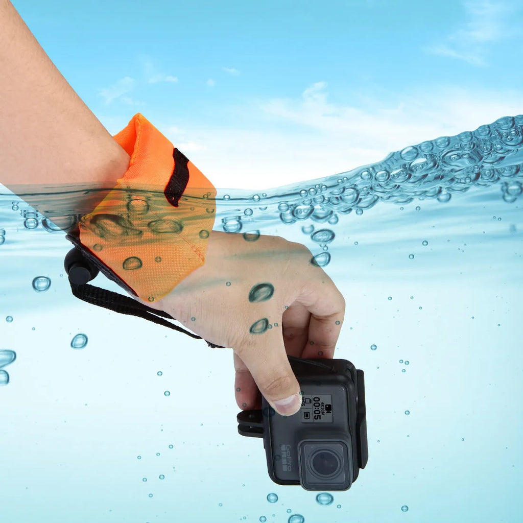 Orange nylon and foam camera buoyancy belt diving floating wrist strap on surface