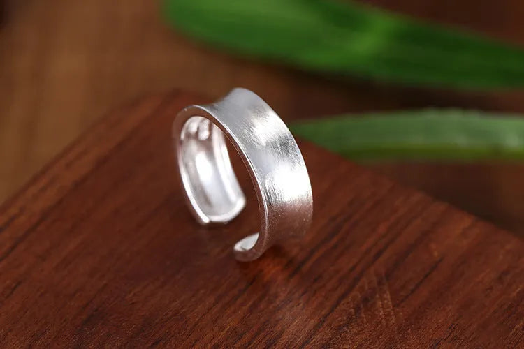 Frosted sterling silver open ring with geometric design and adjustable opening