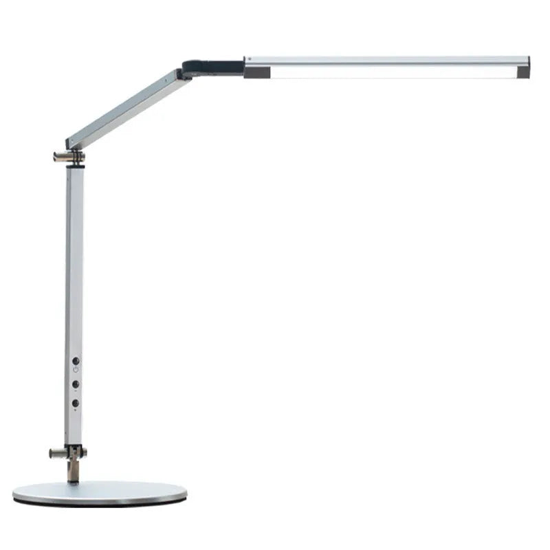 Adjustable LED desk lamp with clip attachment in black finish on wooden desk
