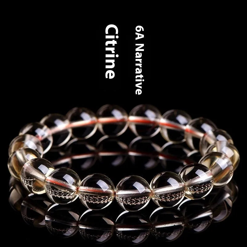 Natural citrine scattered beads ball bracelet showing golden polished stones on a wrist, available in 7A and 6A grades.