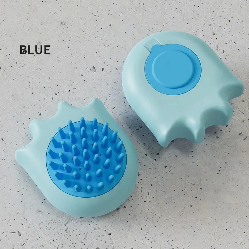 Blue pet bath brush and massage comb for dogs and cats with integrated shampoo box.