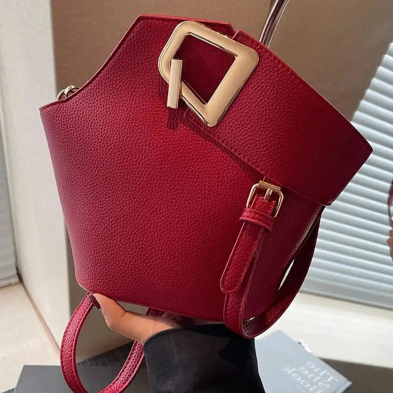 Light luxury commuter crossbody women's basket bag in PU leather bucket shape with internal phone pocket