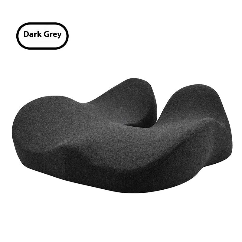 Grey memory foam office chair cushion measuring 46x43x12cm on a chair.