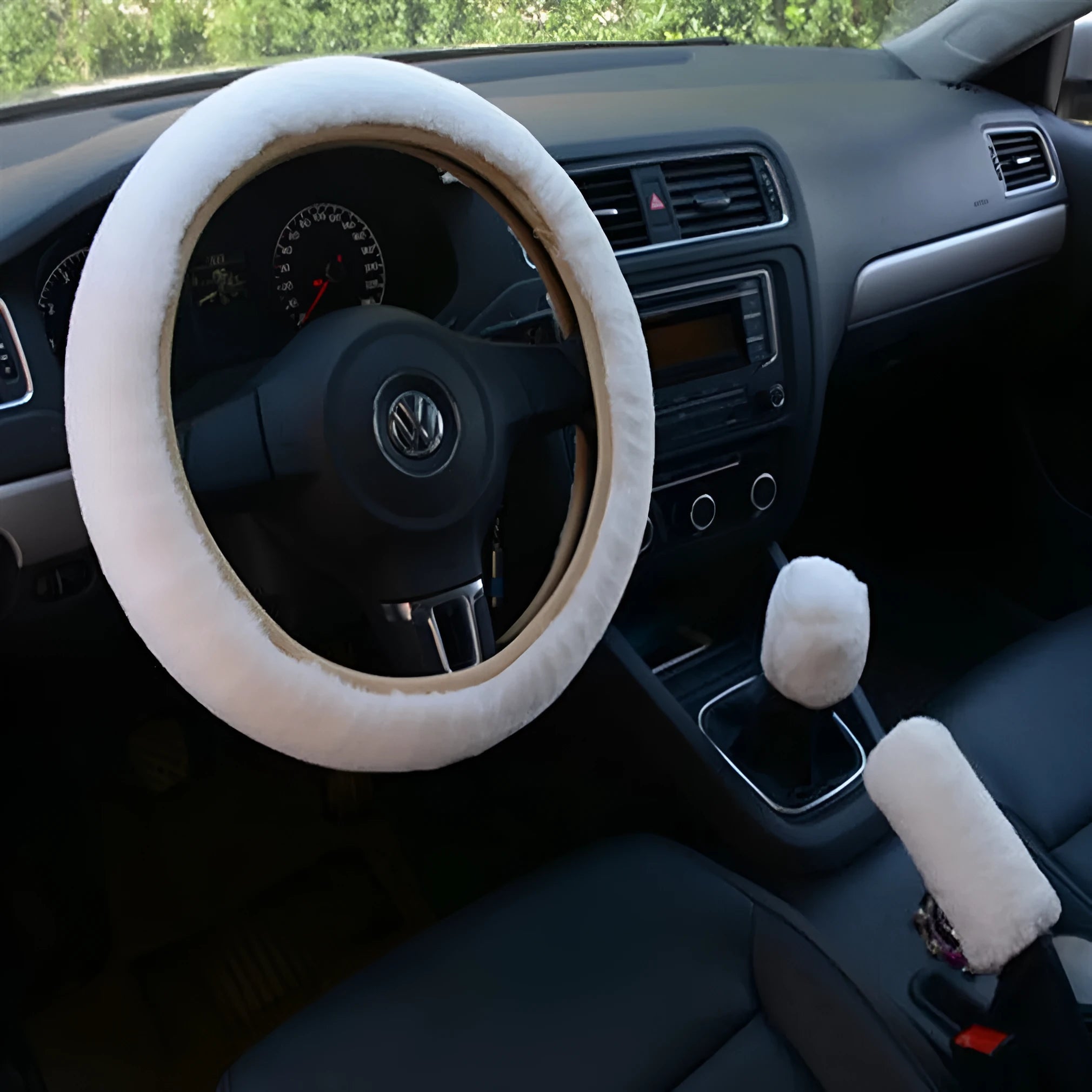 Plush car steering wheel cover set with brake handle and gear shift covers in six colour options.