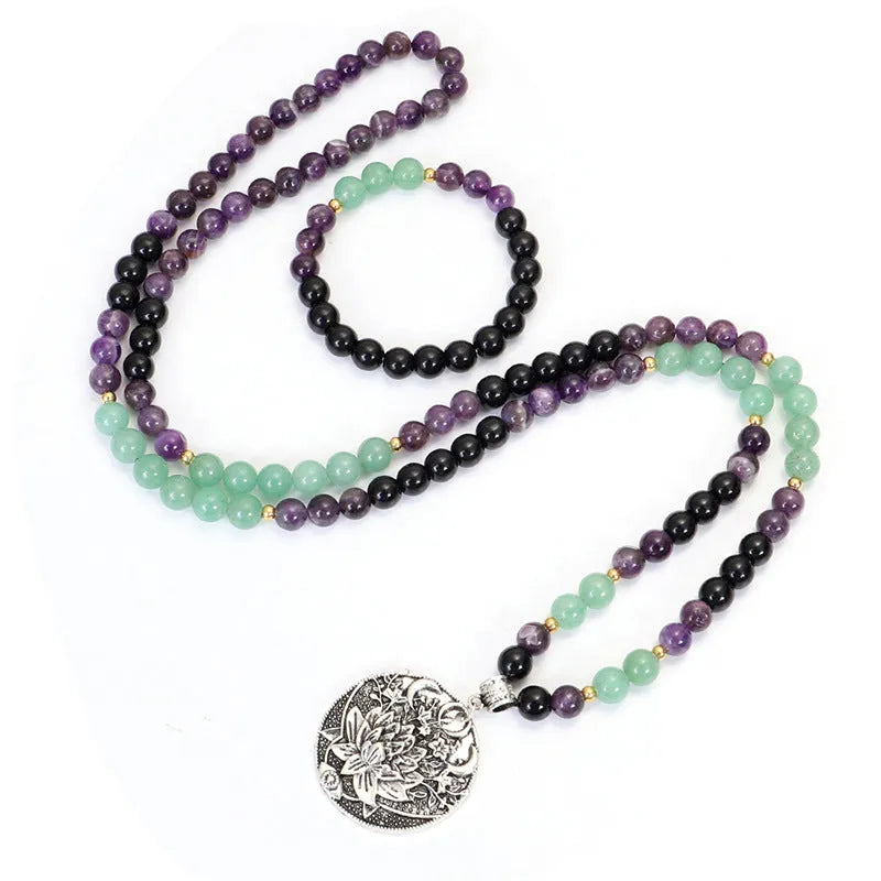 Dongling long necklace with geometric lotus pendant and adjustable cord alongside matching bracelet