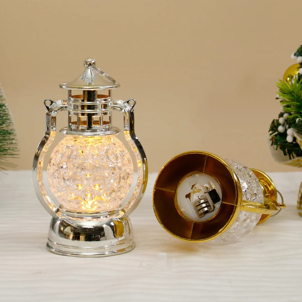 Retro oil lamp style LED night light in gold or silver finish measuring 14.5cm tall