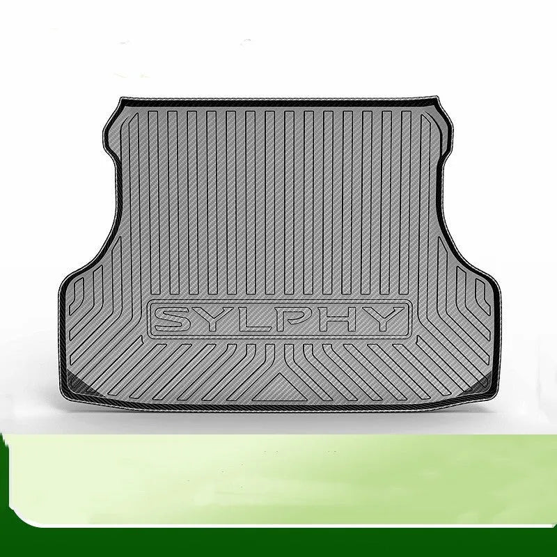 Black TPE car boot liner mat with a carbon fibre pattern texture, laid flat.