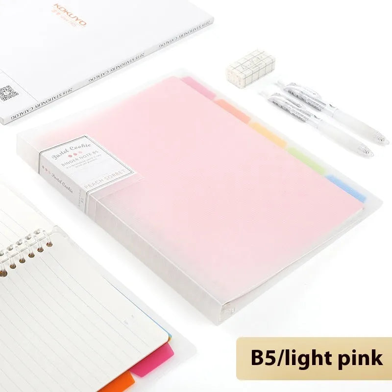 Refillable loose-leaf spiral notebook in B5 size with a pastel blue PP cover and lined pages.