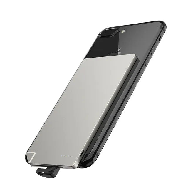 Sliver-coloured graphene battery power bank, 4000mAh capacity, shown next to a mobile phone.