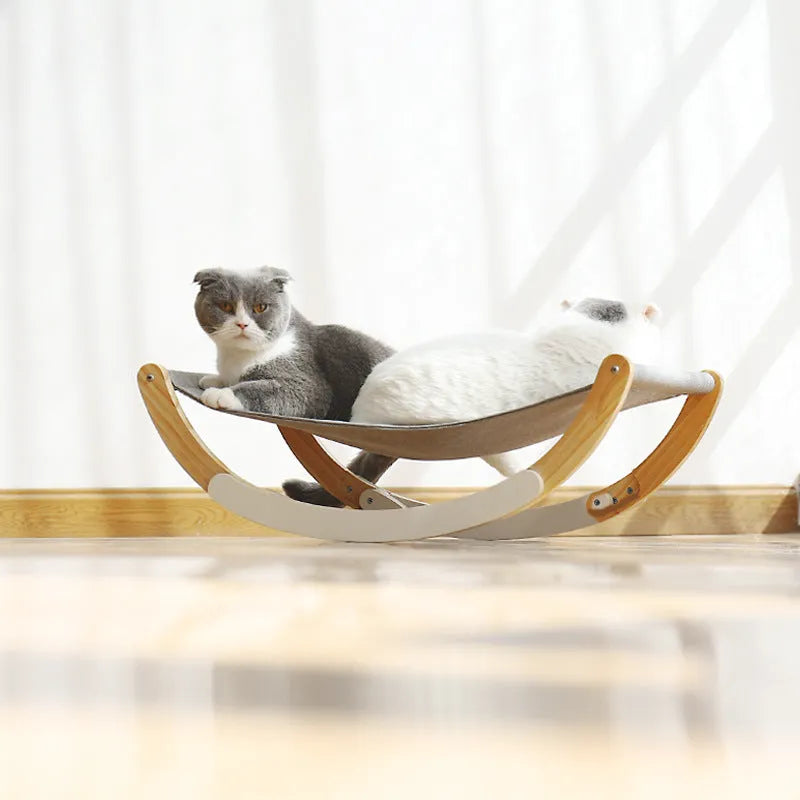 Solid wood cat shaker pet nest with off-ground design, anti-slip mat, and grey or blue cloth cushion, 56.5x30cm