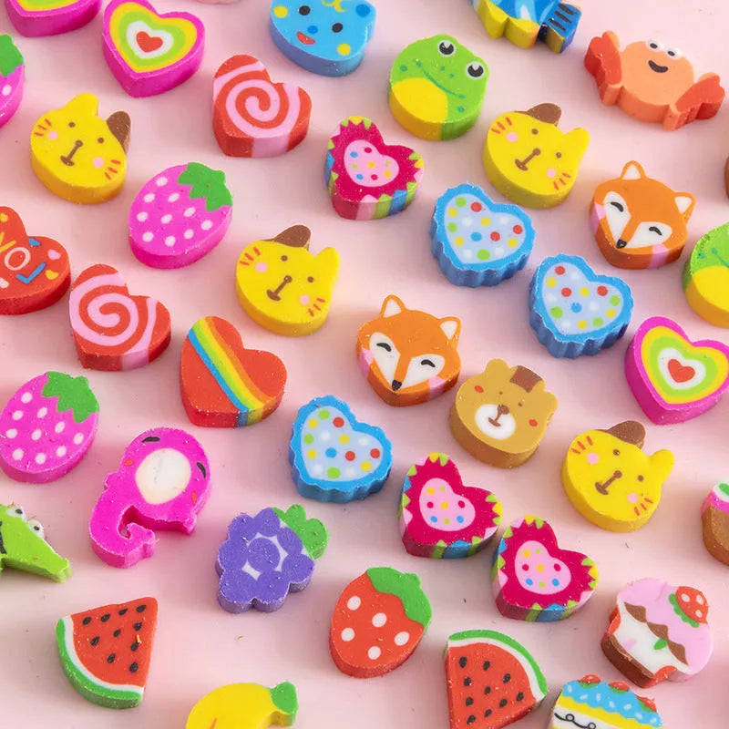 Sealed plastic bag containing 50 small cartoon-themed erasers in shapes like fruits, animals, and Christmas symbols.